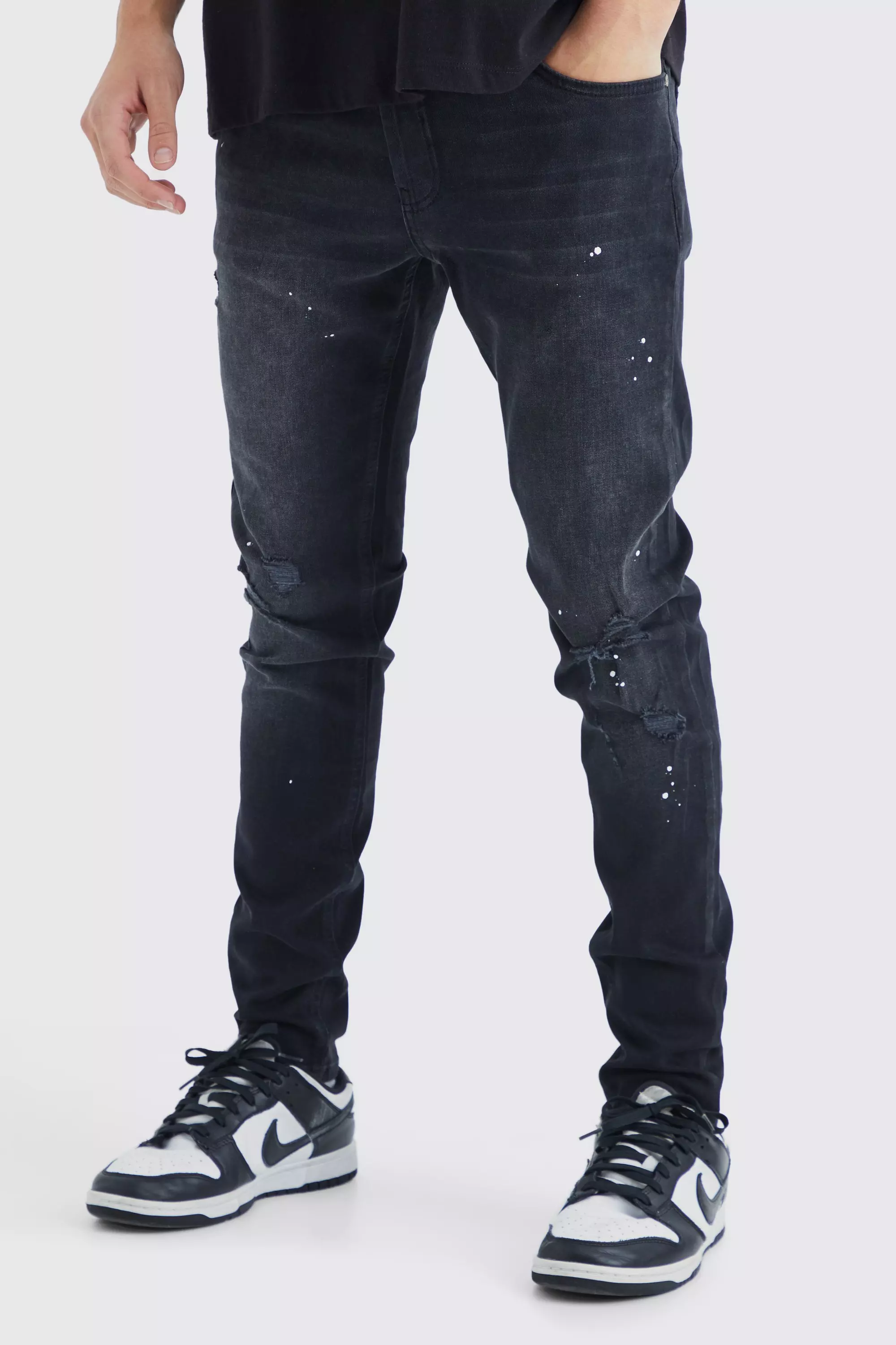 Distressed paint splatter jeans deals